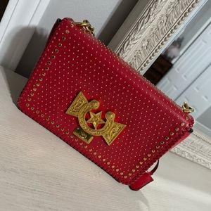Selling a beautiful red purse. Never used